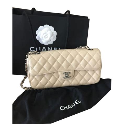 chanel 19 cream bag|cost of chanel bags.